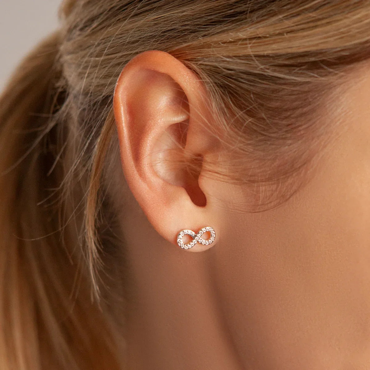 D&X Keira Silver Plated Clear Cubic Zirconia Infinity Stud Earrings